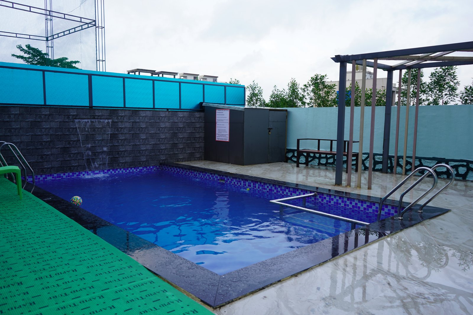 Private swimming pool with loungers